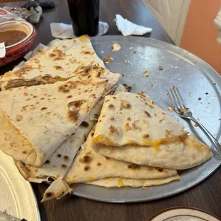 The almighty quesadilla is bigger than a pizza.