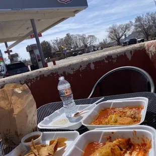 Enchilada plate and carne adovado burrito with chili and cheese with chips and salsa
