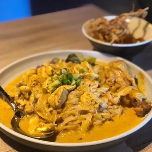  bowl of noodles with a spoon