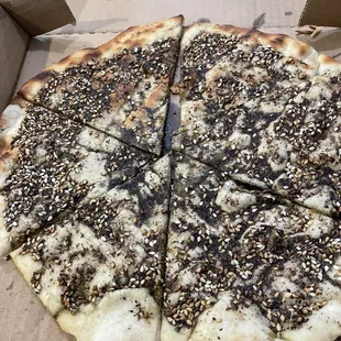 Starting look of the manakish. Great seasoning.