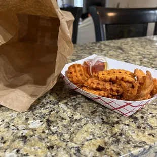 Our sweet potato fries that came with our $65 family meal.... Where is the rest?