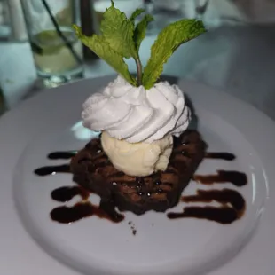 a dessert with ice cream and mint