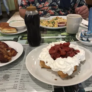 This was a Belgian waffle Belgian waffle with strawberries and whipped cream