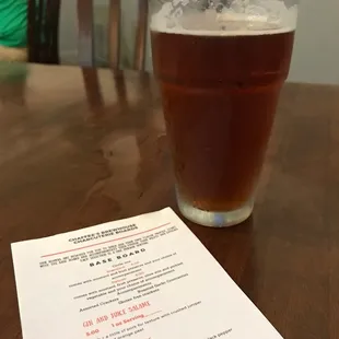 a glass of beer on a table