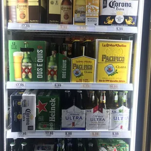 a selection of beer in a cooler