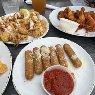 Mozzarella sticks, wings, Fried Calamari.