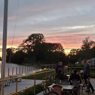 a sunset over a river