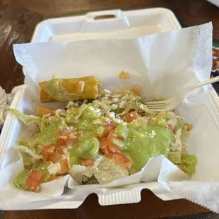 Rolled shredded beef tacos.  Very flavorful