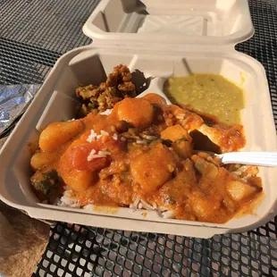 a take out container of food