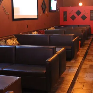 a row of couches and tables