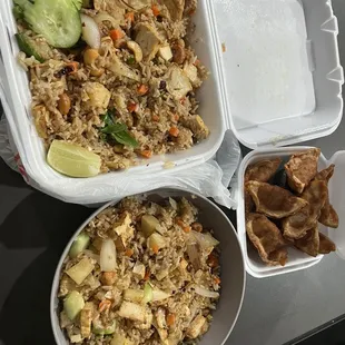 One order pineapple friend rice  And pot stickers!
