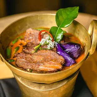 Sous vide 12 hours braised beef cheeks in Panang curry, green beans and jasmine rice