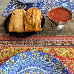 Samsa with tomato sauce