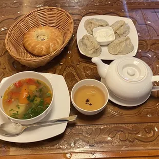 Manti, shura soup, tea, &amp; bread. Delicious try it  Tajikistan's food is quite good.
