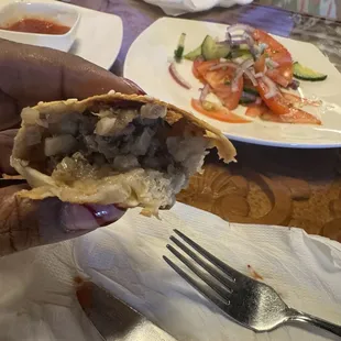 Sambusa and half the meat is already in my belly.