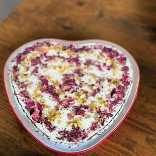 Celebrate love with sweetness!  Indulge in our Valentine&apos;s Kulfi Cake and Rose Pistachio Loaf--the perfect blend of elegance and flavor.