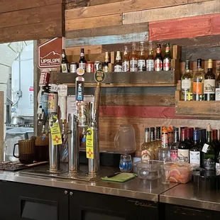 a bar with bottles of alcohol