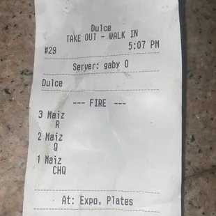 This is the receipt with the time I visited and the cheap material cup holder.
