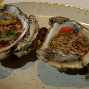 Freshly east coast oyster with red nahm jim shallot cilantro