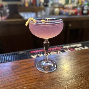 Empress 75: Empress 1908 Gin, lemon juice, simple syrup, champagne float