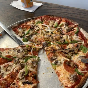 a slice missing from the pizza