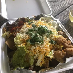 a meal in a styrofoam container