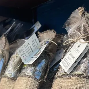 a shelf full of bags of food