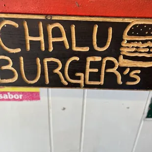 a sign that says chalu burgers