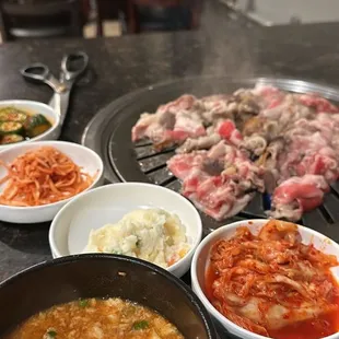 Spicy tofu, beef belly, kimchi