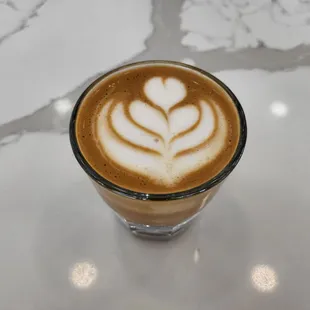 Cortado with oatmilk, crafted by barista Madi