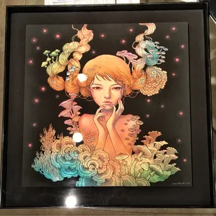 Signed and numbered Audrey Kawasaki floating perfectly in its frame.