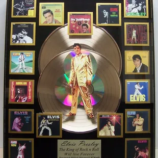 Elvis Presley in his Gold Lame Suit Mounted on 3 CD's and 2 Gold Records surrounded by 17 of his Albums. For Sale $195