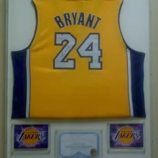 Laker Jersey with Laker Logo's and Certificate of Authenticity in Clear Acrylic Shadow Box Frame!