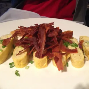 Japanese omelette (tamago) with house smoke chorizo, sweet potato, cana de oveja, and scallions