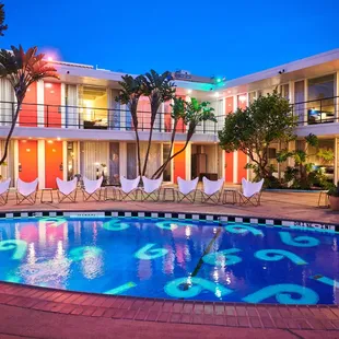 a hotel pool at night