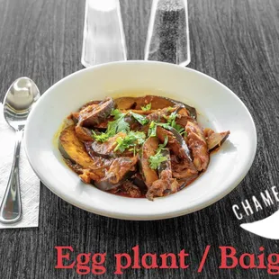 a bowl of eggplant and bacon