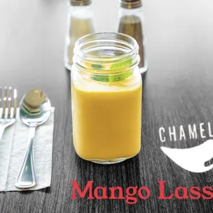 a jar of mango lassi on a table