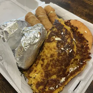 Sampler platter with arepas, empanadas, and so on