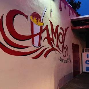 the name of a restaurant painted on the side of a building