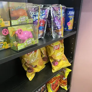 a shelf full of snacks