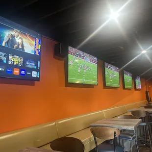 a row of tables and chairs