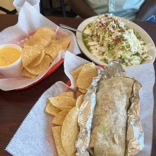 Chips and piping hot cheese sauce