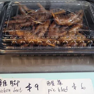 Braised chicken feet, $9