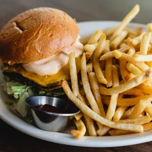 a cheeseburger and fries