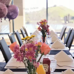 Sunday Brunch - table for 18. I decorated it a bit myself with flowers and candles.