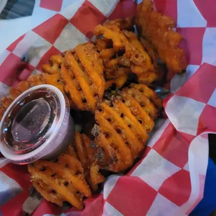 Fried sweet potatoe waffle fries.