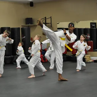 Kids beginning students ranging in size, age and athleticism.