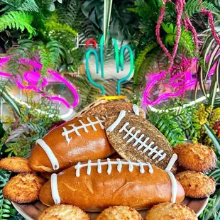 a platter of hot dogs with football decorations