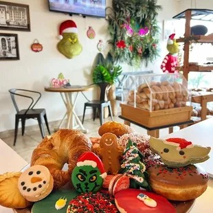 a plate of doughnuts and pastries