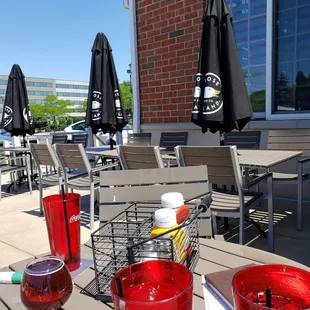 two glasses of red wine on a table